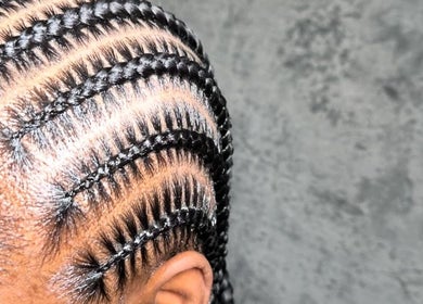 Intricate cornrow braids at BeautyByFaves YYC in Calgary, Alberta, CA, showcasing expert hairstyling.