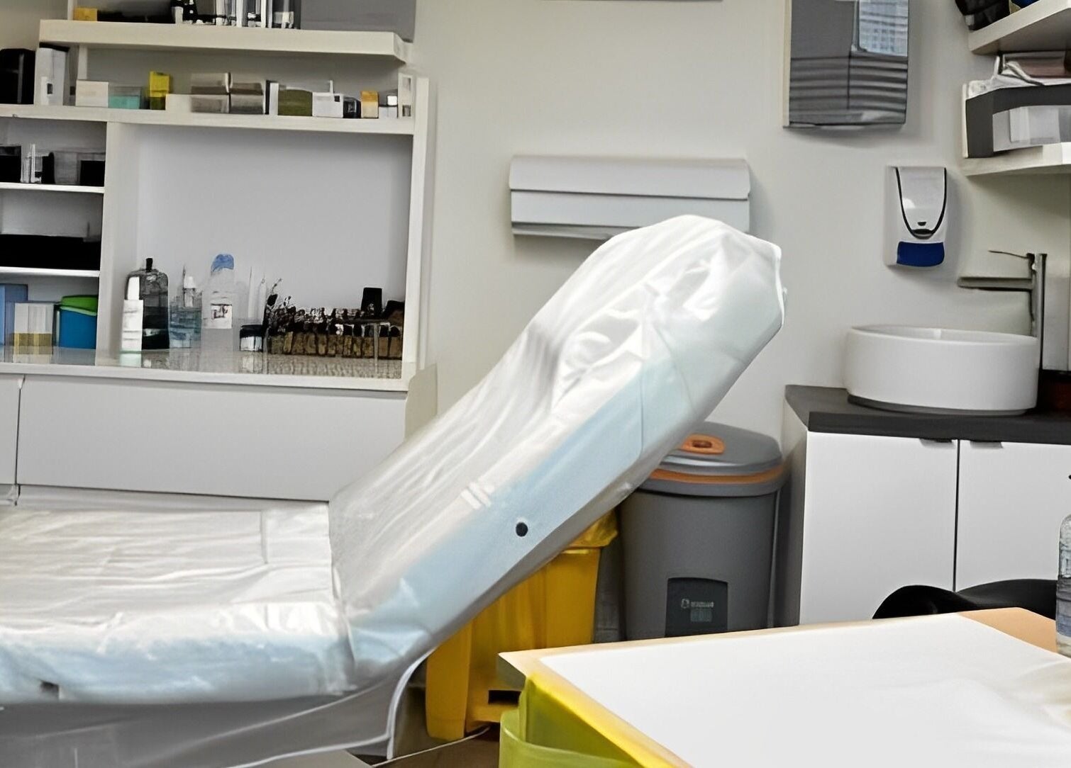 Modern treatment room at Fran Wainwright Beauty and Aesthetics in Annan, Scotland, GB with a white leather chair.