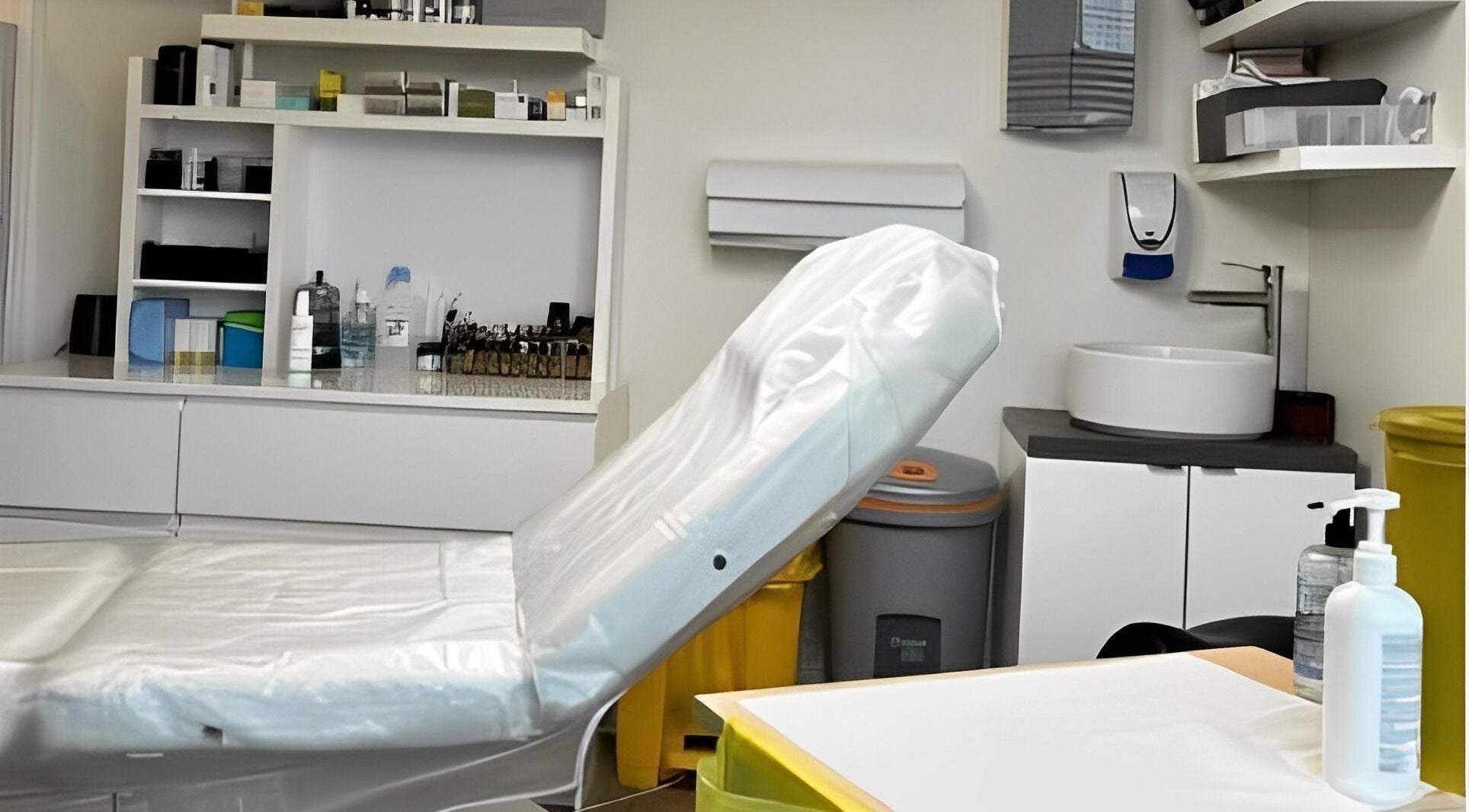 Modern treatment room at Fran Wainwright Beauty and Aesthetics in Annan, Scotland, GB with a white leather chair.