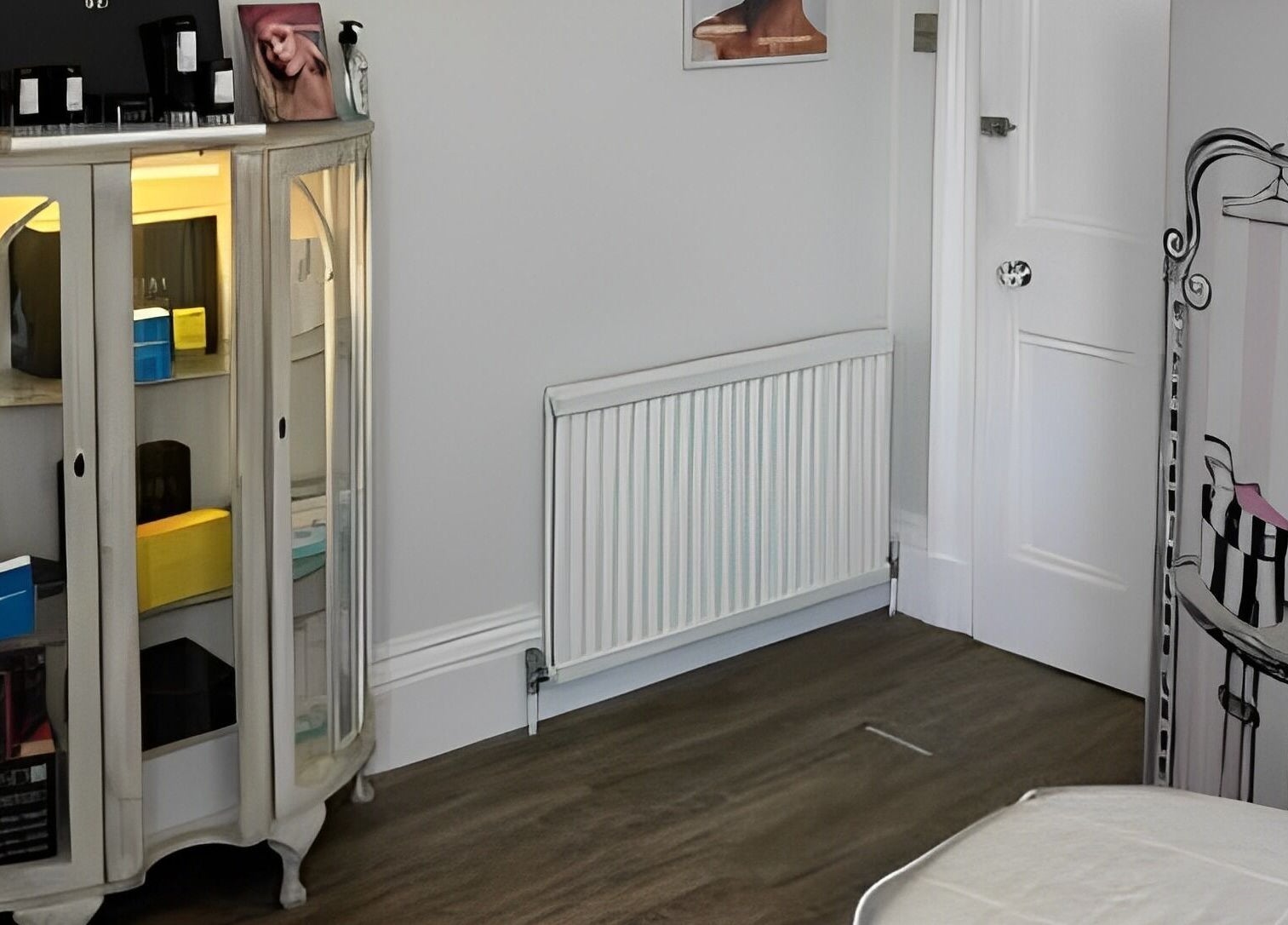 Elegant display cabinet at Fran Wainwright Beauty and Aesthetics in Annan, Scotland, GB, showcasing beauty products.