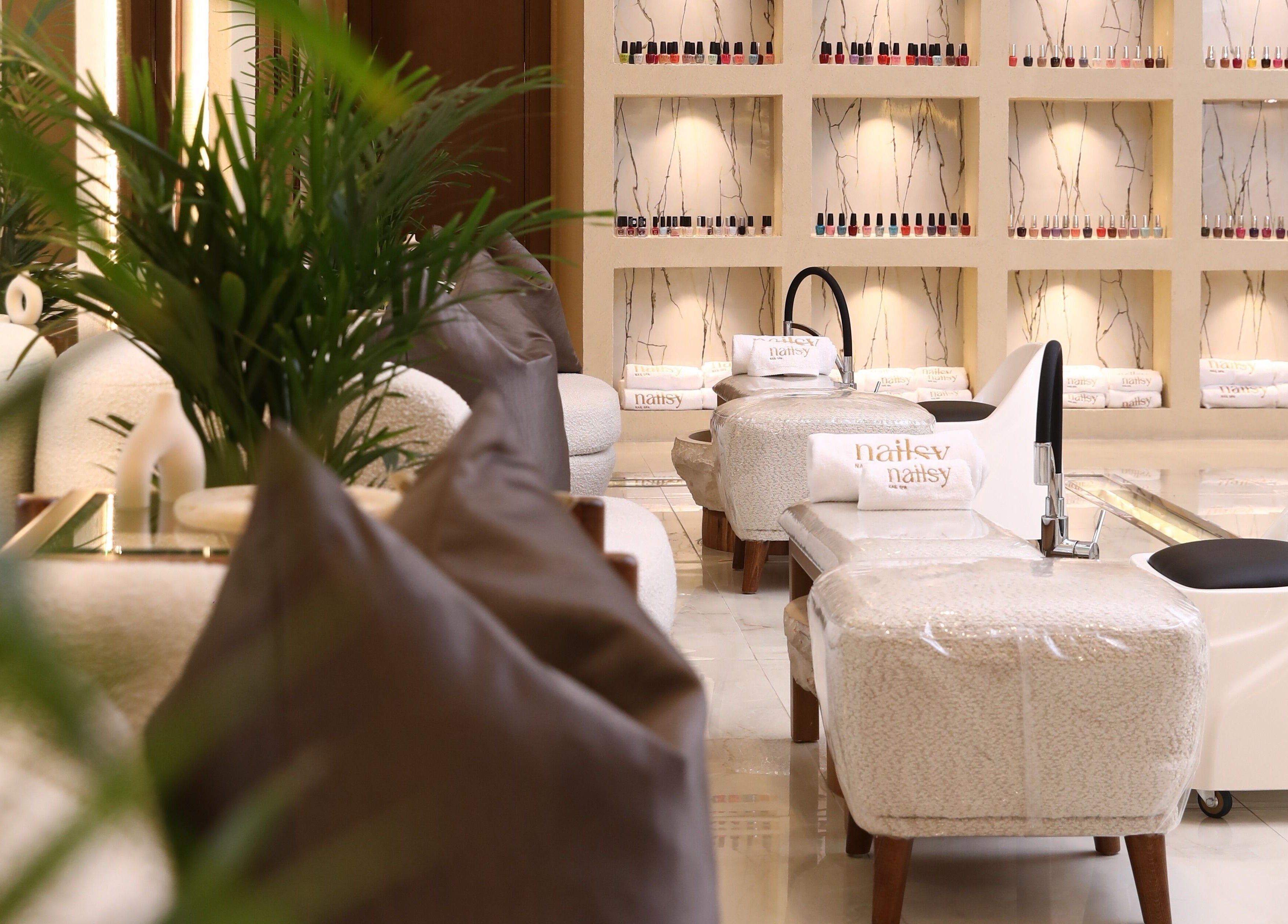 Chic Nailsy salon in Riyadh, Riyadh Province, SA with plush seating and manicure stations.