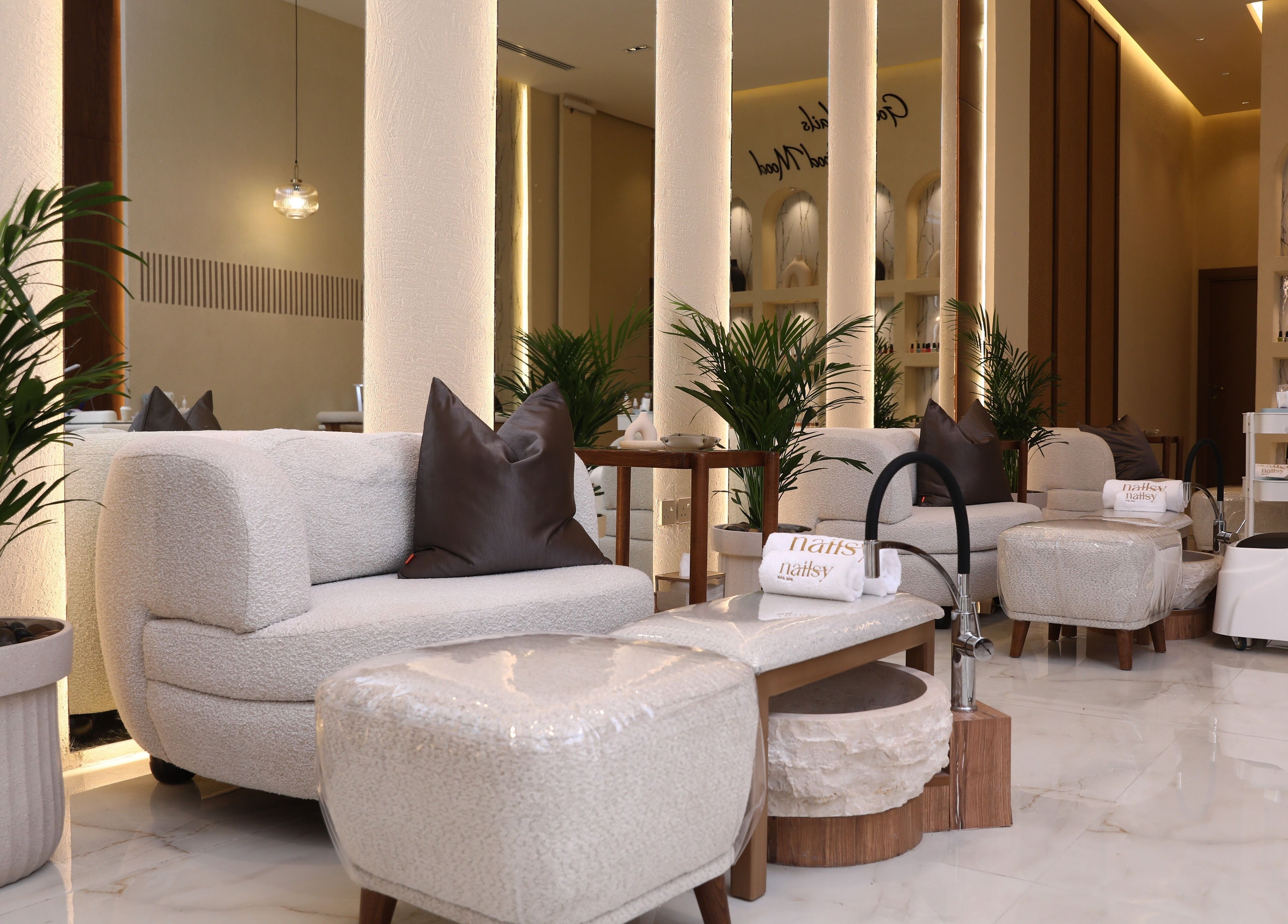Luxurious Nail Lounge at Nailsy, Riyadh, Riyadh Province, SA with plush seating and serene decor.