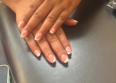 Elegant nail design at Cillah Nails in Cape Town, Western Cape, ZA, showcasing stylish manicured hands.