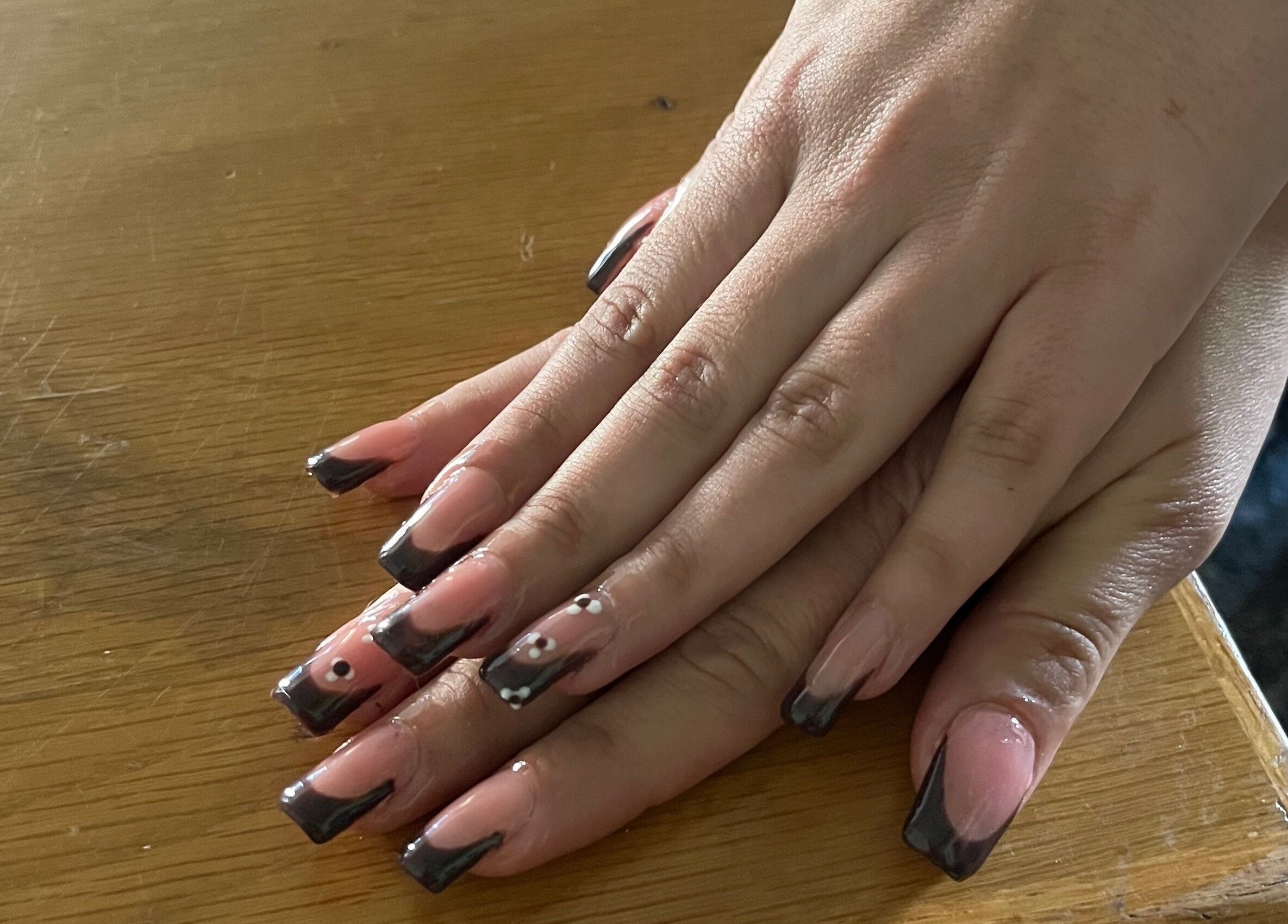 Stylish nail art with black tips at Cillah Nails, Cape Town, Western Cape, ZA.