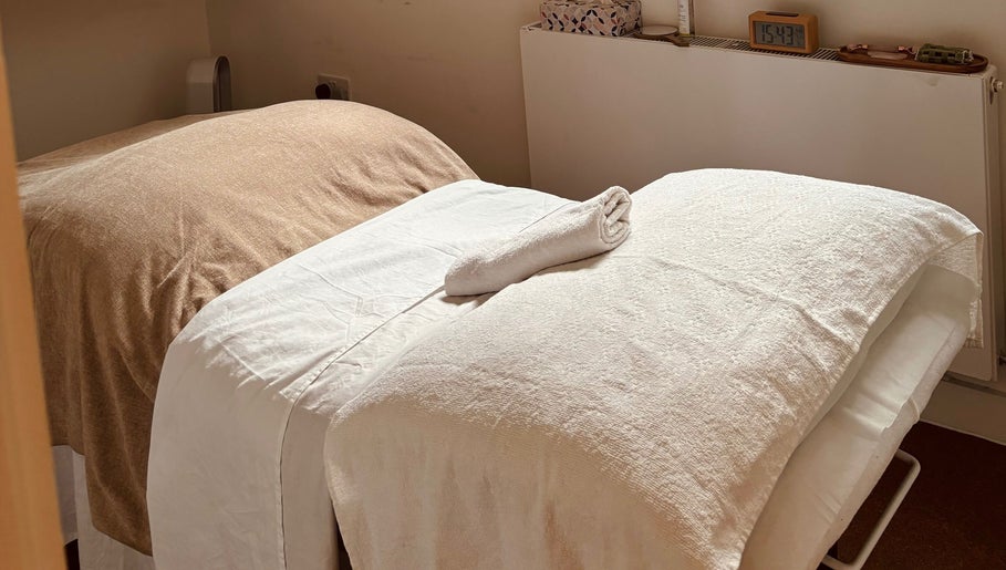 Relaxing treatment room at Adeline Peillet at East of Eden - Walthamstow E17, London, England, GB with cozy massage bed.