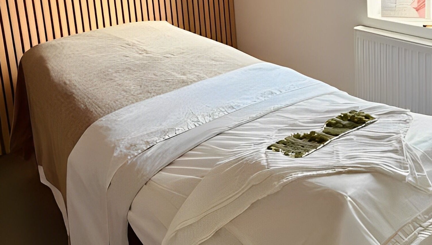 Serene massage bed at Adeline Peillet at Pause Studio - Leyton E11, London, England, GB, ready for relaxation.