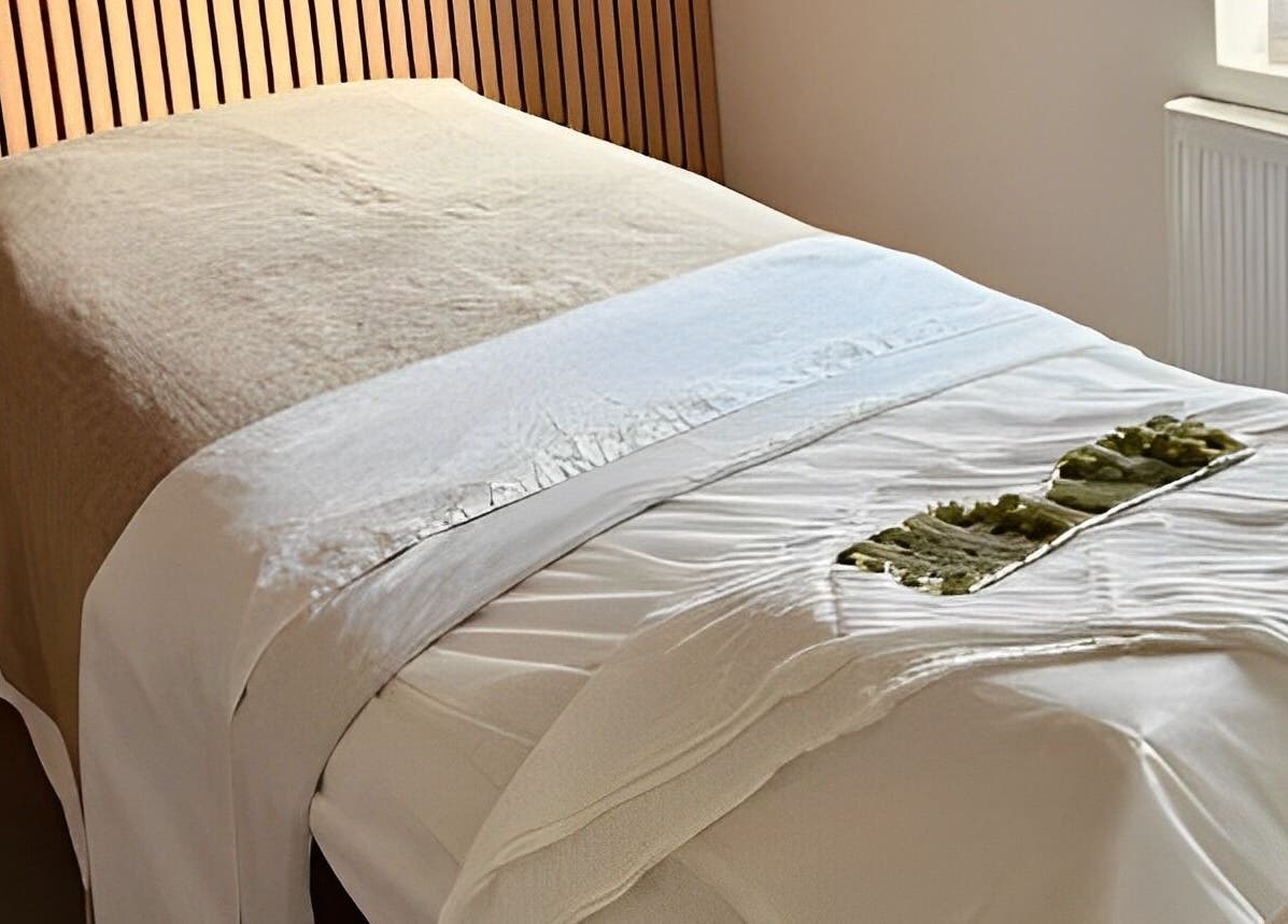 Serene massage bed at Adeline Peillet at Pause Studio - Leyton E11, London, England, GB, ready for relaxation.