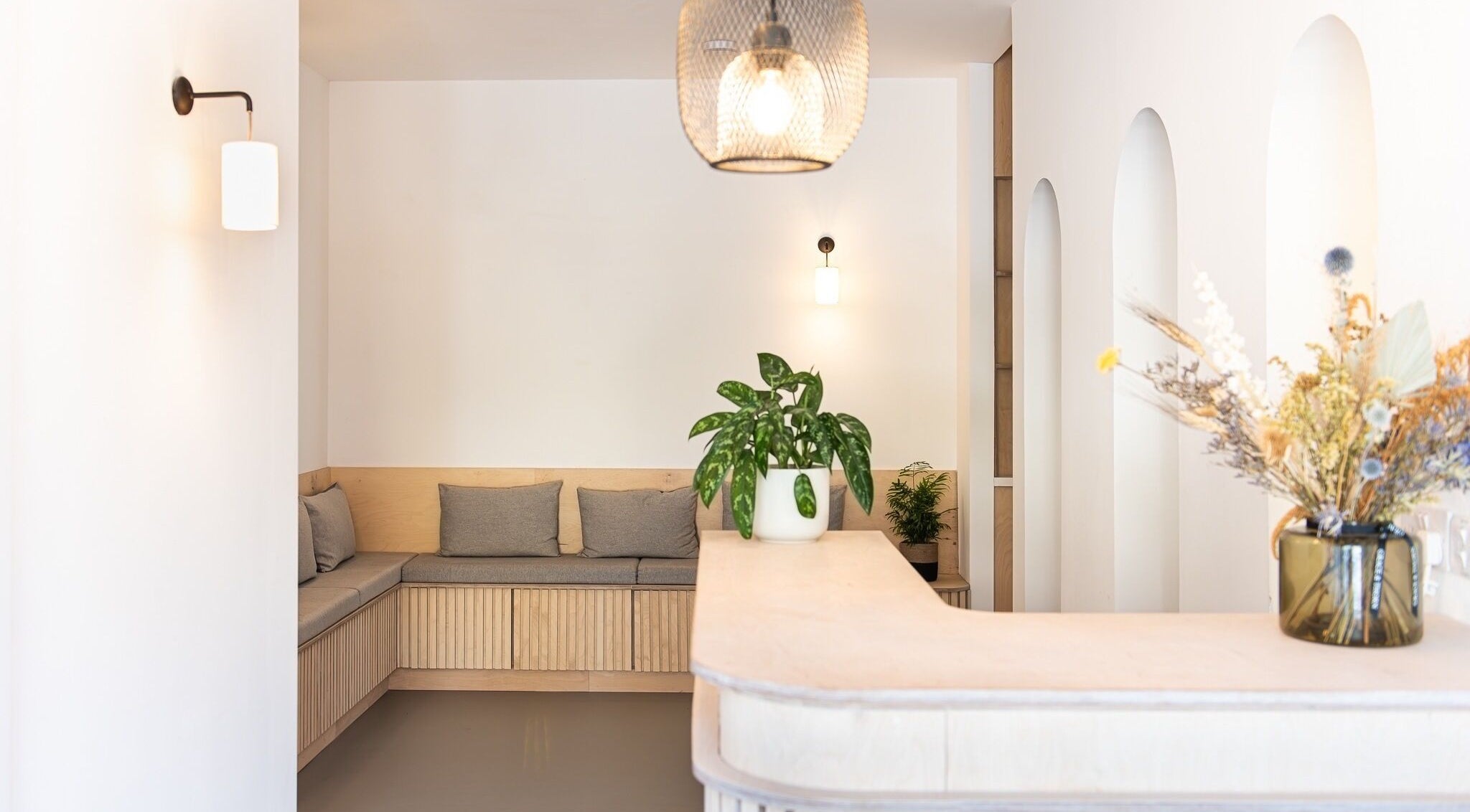 Cozy seating area at Adeline Peillet at Pause Studio - Leyton E11, London, England, GB with elegant decor.