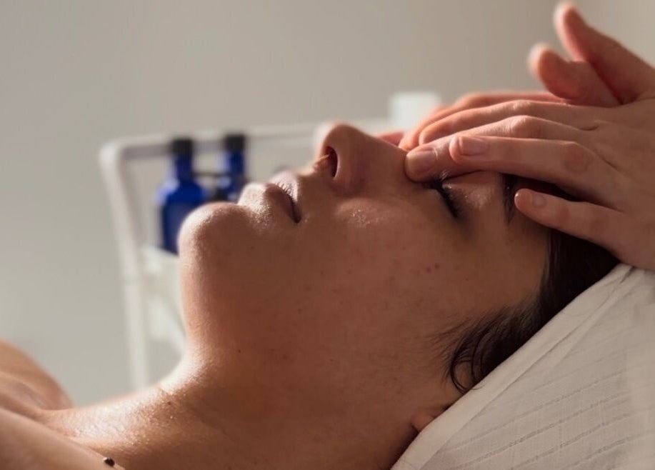 Facial massage at Adeline Peillet, Pause Studio - Leyton E11, London, England, GB, enhancing relaxation.