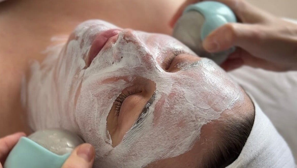 Relaxing facial treatment at Adeline Peillet - Home Visit, London, England, GB with rejuvenating face mask.