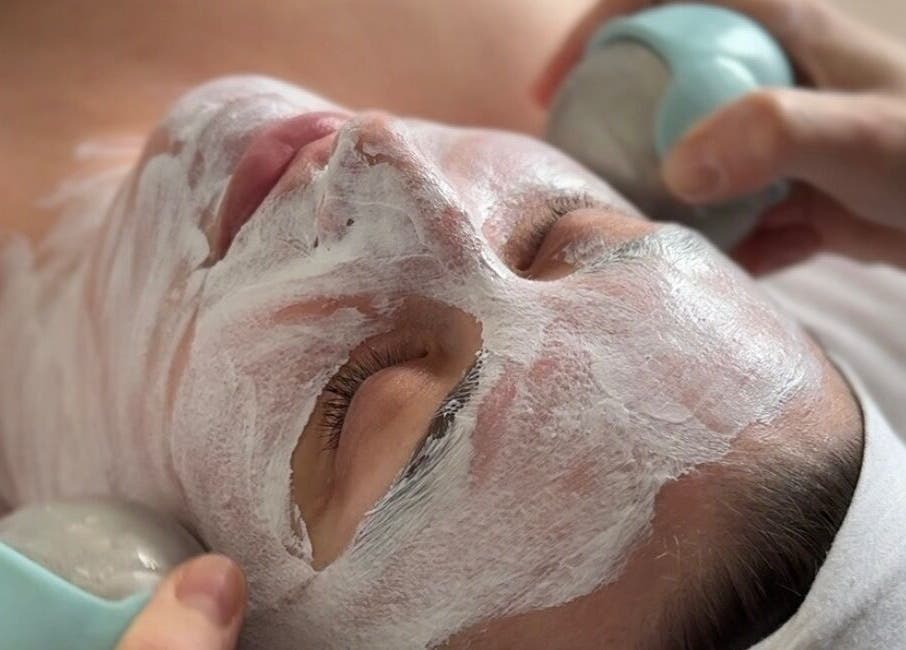 Relaxing facial treatment at Adeline Peillet - Home Visit, London, England, GB with rejuvenating face mask.