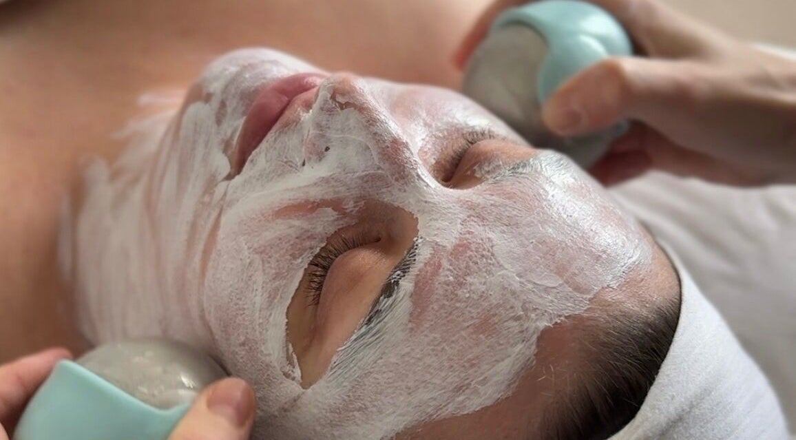 Relaxing facial treatment at Adeline Peillet - Home Visit, London, England, GB with rejuvenating face mask.