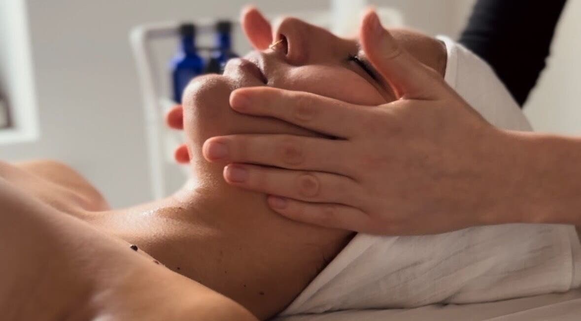 Relaxing facial massage at Adeline Peillet - Home Visit in London, England, GB. Gentle hands providing soothing care.
