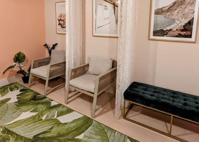 Relaxing seating area at Lite Mind Body Clinic - Harbord Village, Toronto, Ontario, CA with elegant decor.