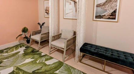 Relaxing seating area at Lite Mind Body Clinic - Harbord Village, Toronto, Ontario, CA with elegant decor.
