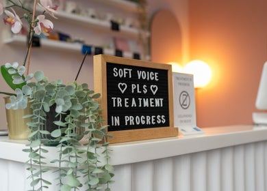 Reception desk at Lite Mind Body Clinic - Harbord Village in Toronto, Ontario, CA with a calming sign and decor.
