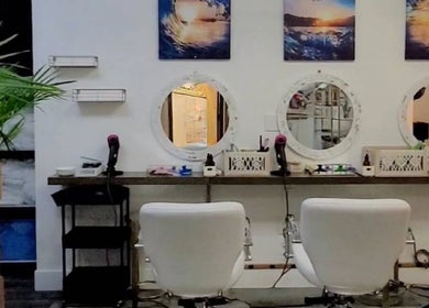 Chic salon styling stations with mirrors at Silky Headspa, San Jose, California, US.
