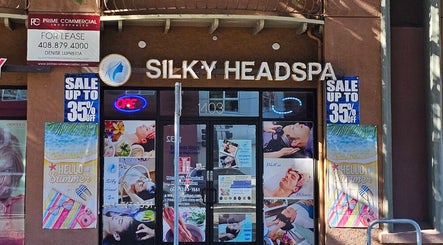 Front view of Silky Headspa entrance in San Jose, California, US showcasing vibrant posters and signage.