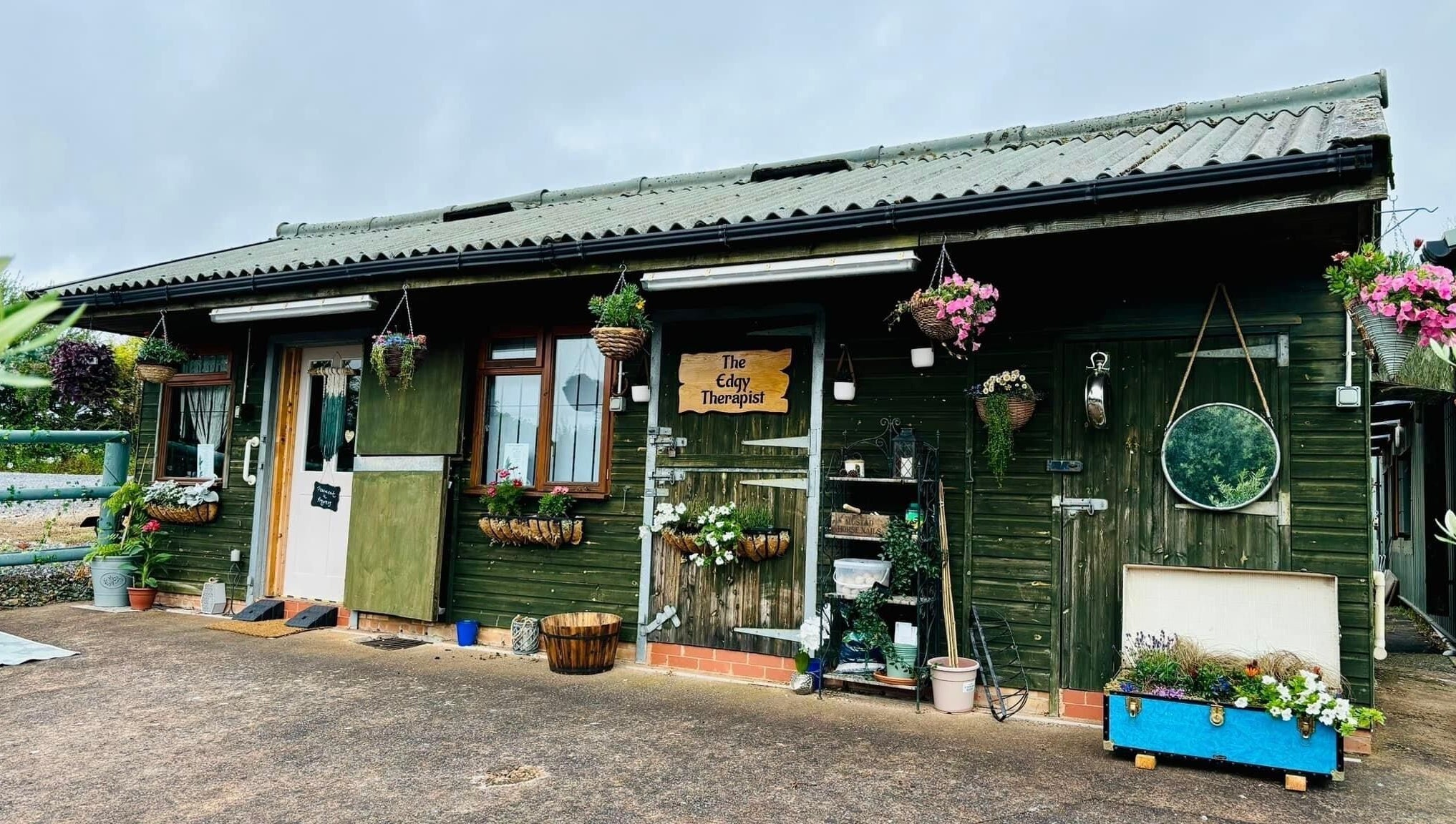 The Edgy Therapist @ The Holistic Hideaway in Broadclyst, England boasts a charming rustic exterior.