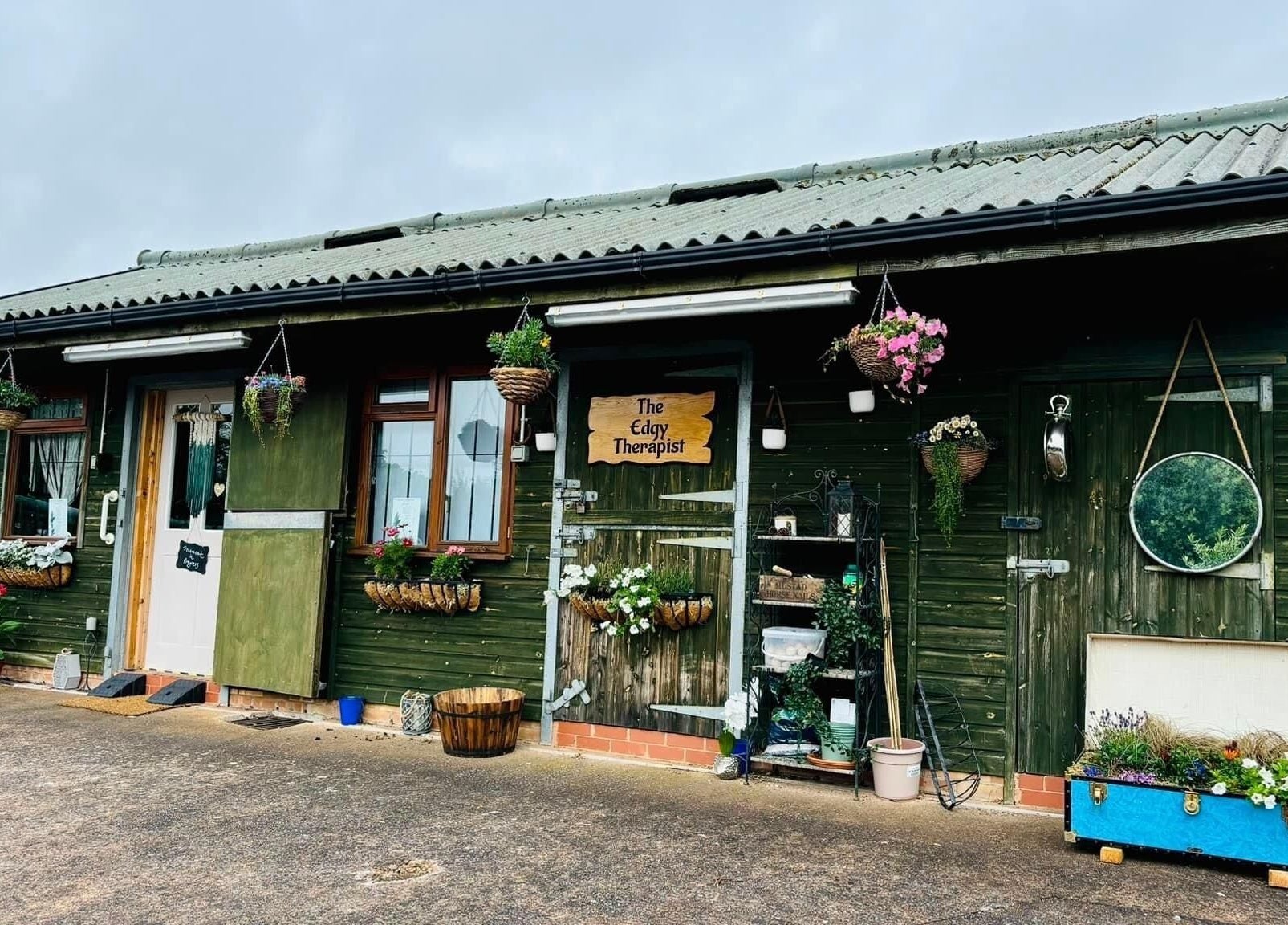 The Edgy Therapist @ The Holistic Hideaway in Broadclyst, England boasts a charming rustic exterior.
