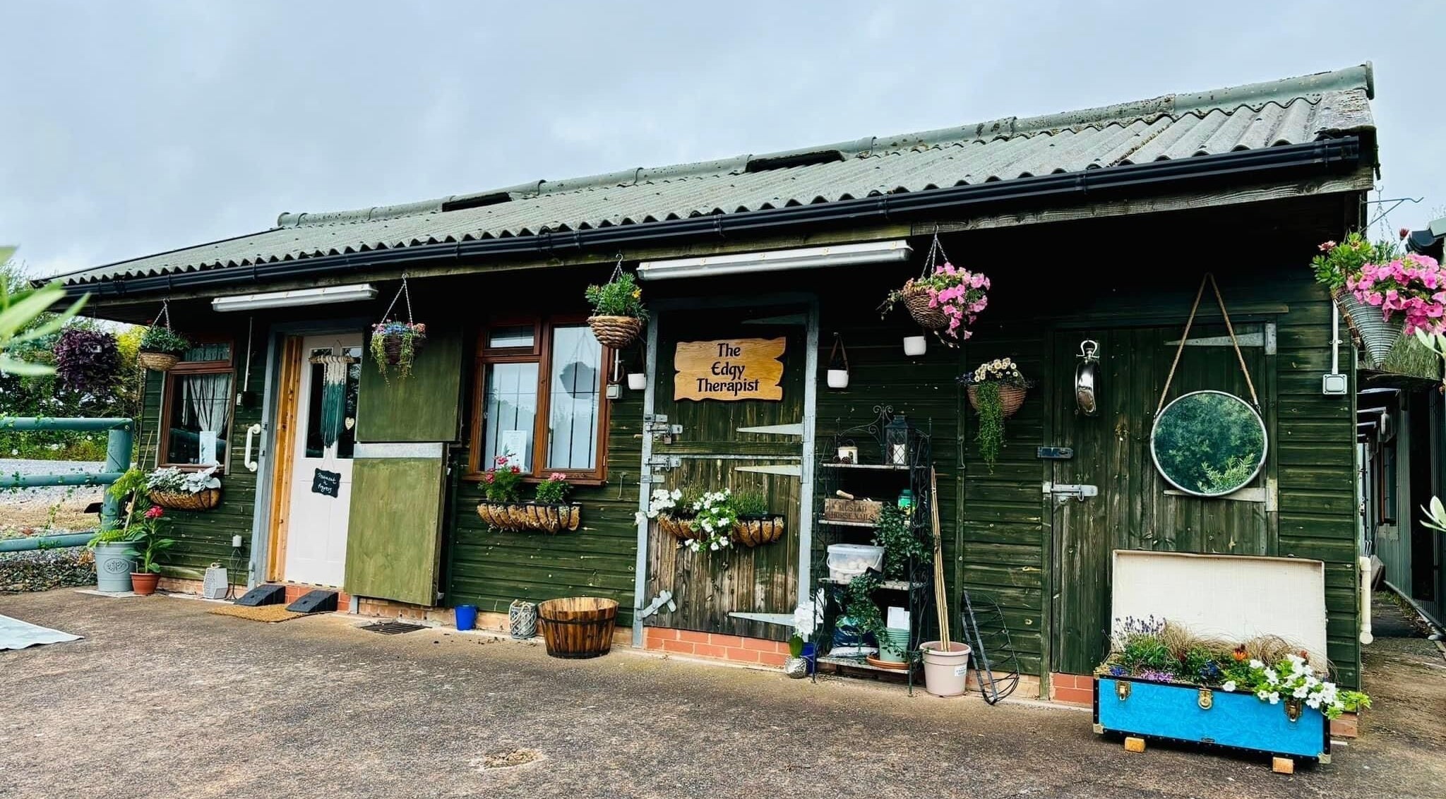 The Edgy Therapist @ The Holistic Hideaway in Broadclyst, England boasts a charming rustic exterior.