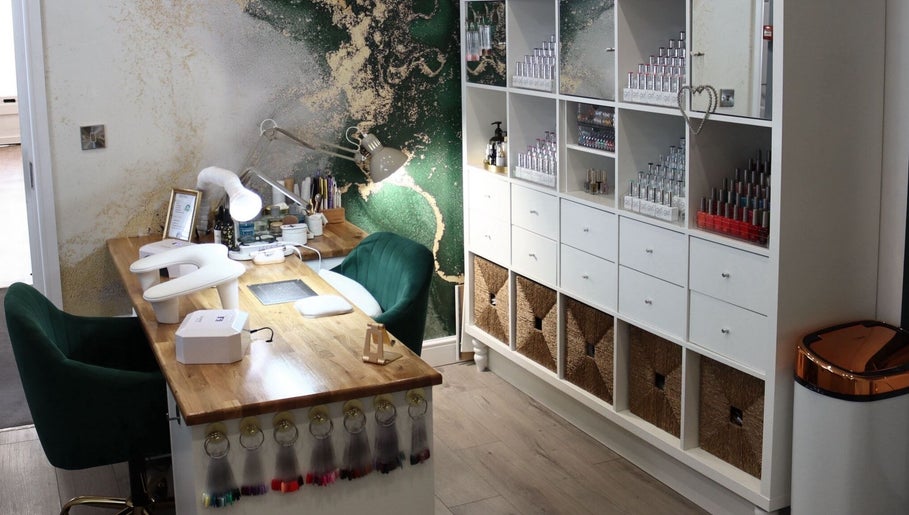 Stylish nail desk at Pure Nails by Rachel, Newtown, Wales, GB with organized storage and chic decor.