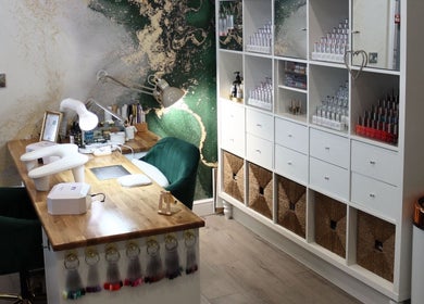 Stylish nail desk at Pure Nails by Rachel, Newtown, Wales, GB with organized storage and chic decor.