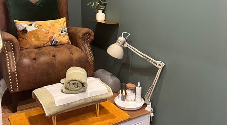 Cozy nail care setup at Pure Nails by Rachel, Newtown, Wales, GB, featuring a luxurious plush chair and treatments.
