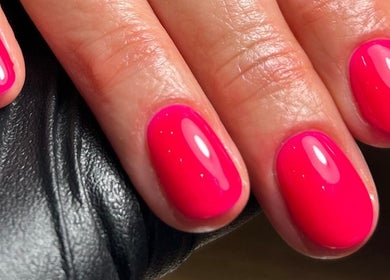 Vibrant red nails at Pure Nails by Rachel, Newtown, Wales, GB, showcasing expert nail artistry.