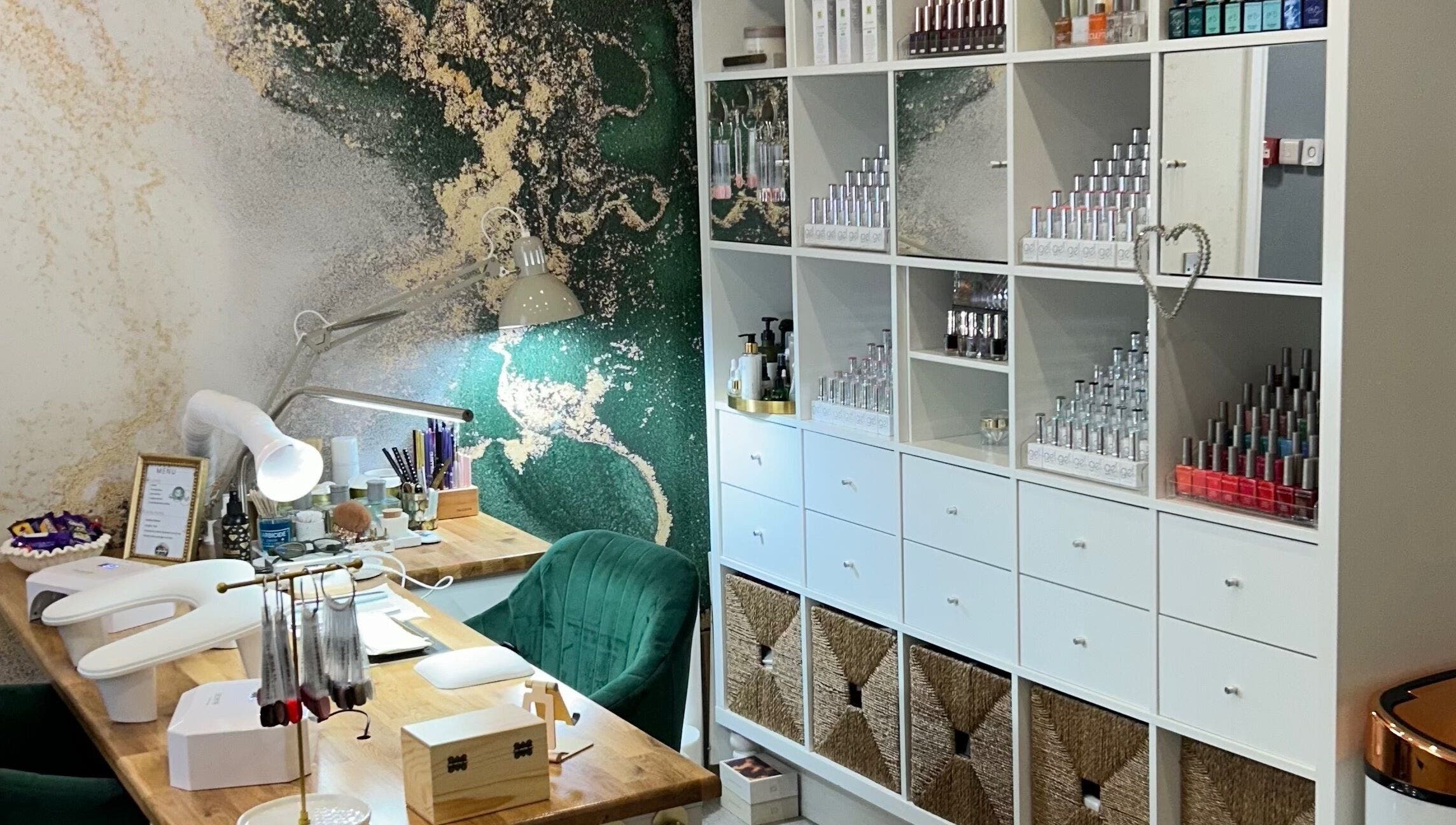 Modern nail station at Pure Nails by Rachel, Newtown, Wales, GB featuring stylish decor and organized products.