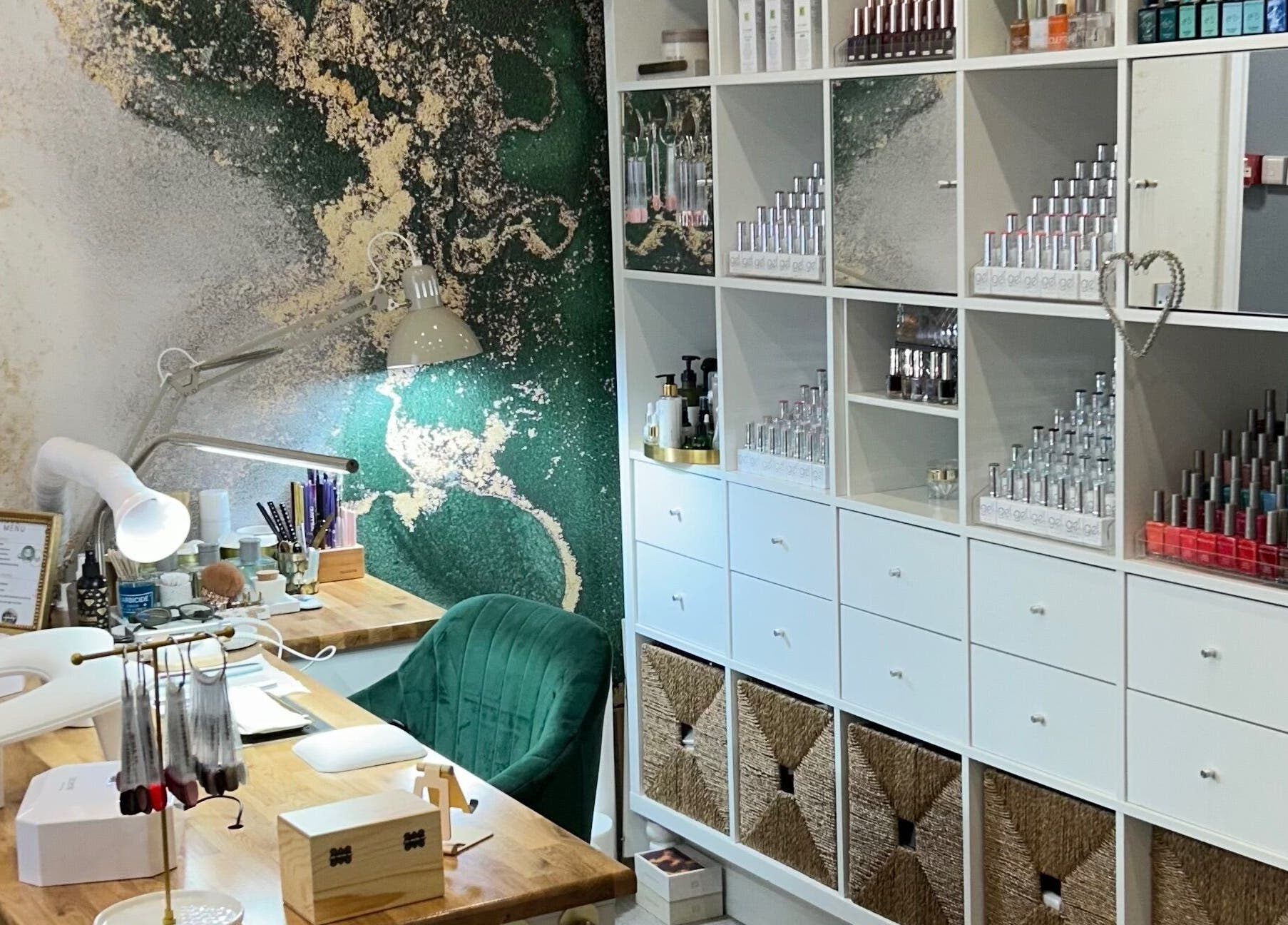 Modern nail station at Pure Nails by Rachel, Newtown, Wales, GB featuring stylish decor and organized products.