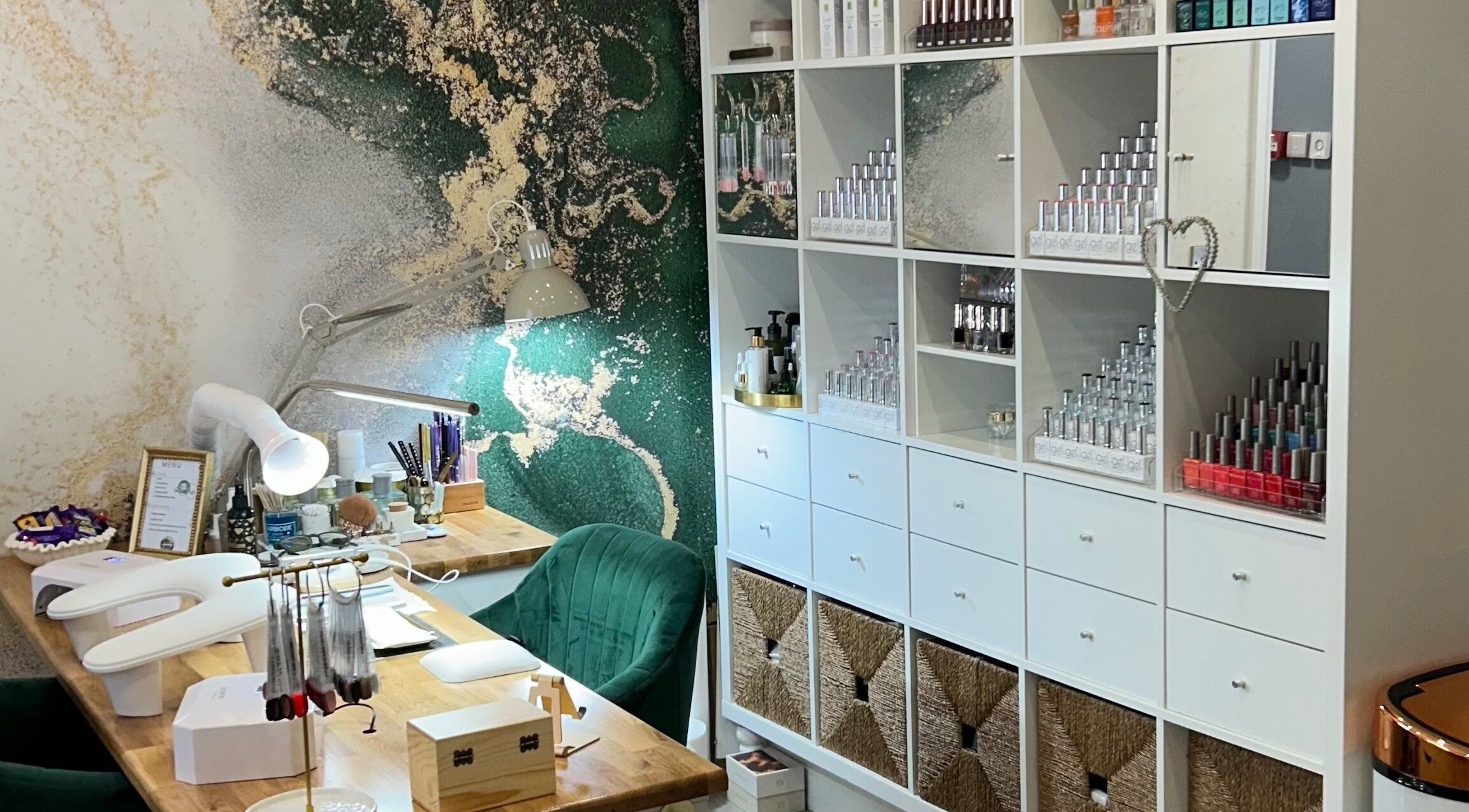 Modern nail station at Pure Nails by Rachel, Newtown, Wales, GB featuring stylish decor and organized products.