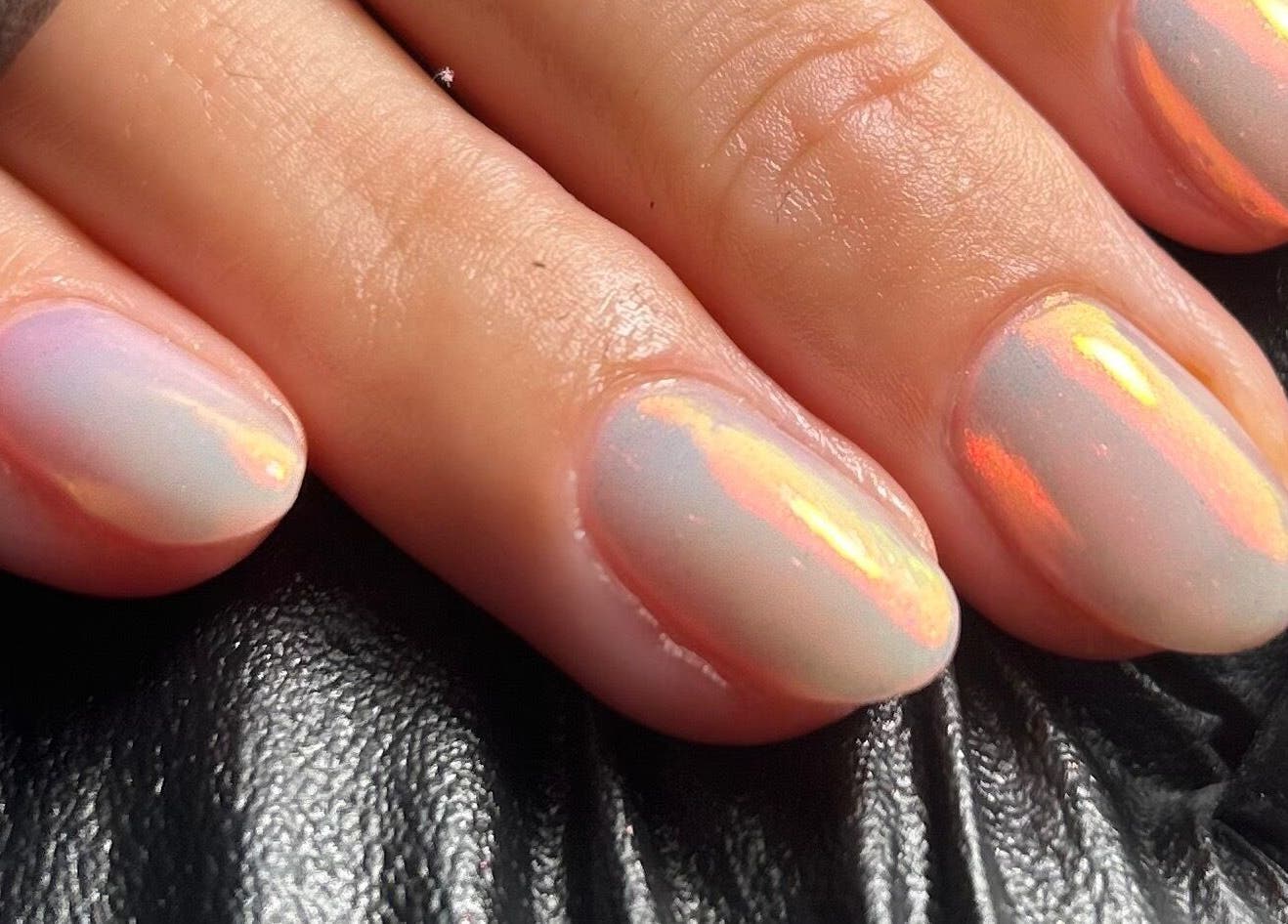 Close-up of radiant opal nails at Pure Nails by Rachel in Newtown, Wales, GB, showcasing elegant shine.