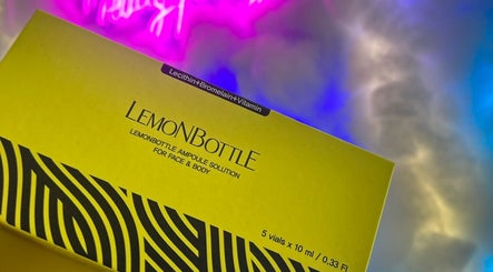 LemonBottle ampoule solution displayed at The Skin Dollhouse, Bradford, England, GB under vibrant lighting.