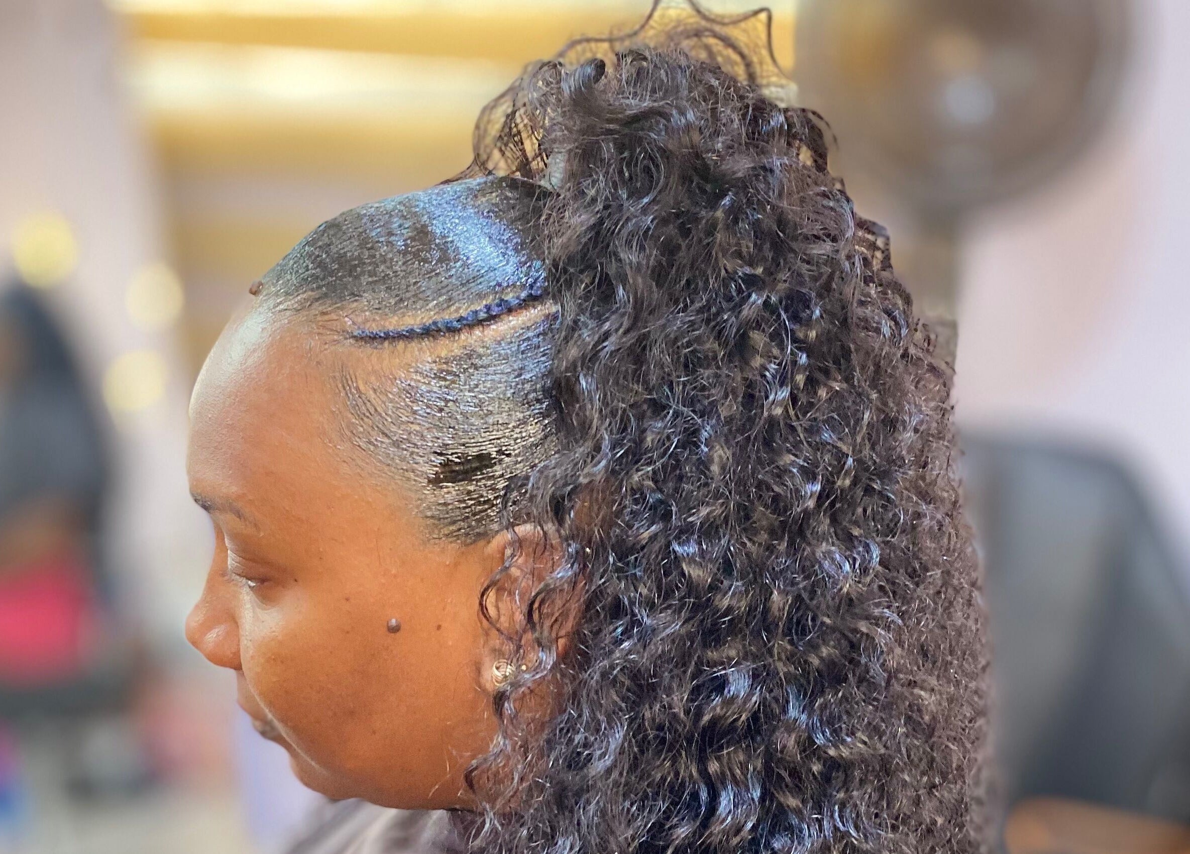 Intricate curly hairstyle at Haus Of Lisa J, Bridgetown, Saint Michael, BB.