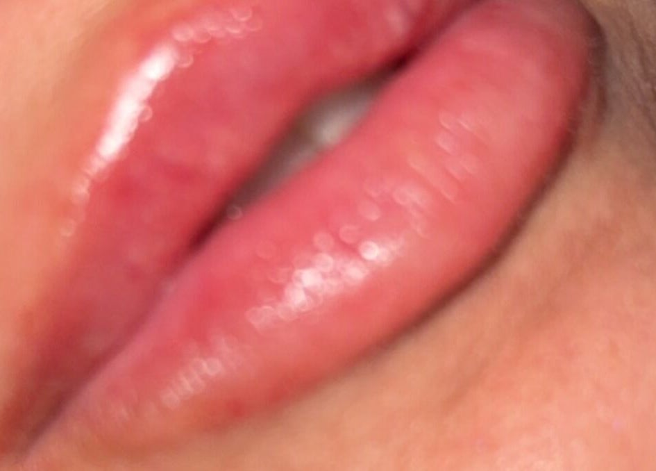 Glossy lips enhance beauty at AB Beauty, Newton Abbot, England, GB.