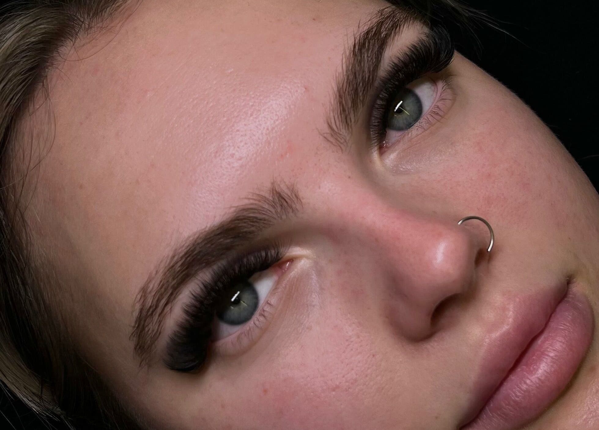 Close-up of eyelash extensions at Lashitude in Crowthorne, England, GB showcasing flawless beauty results.