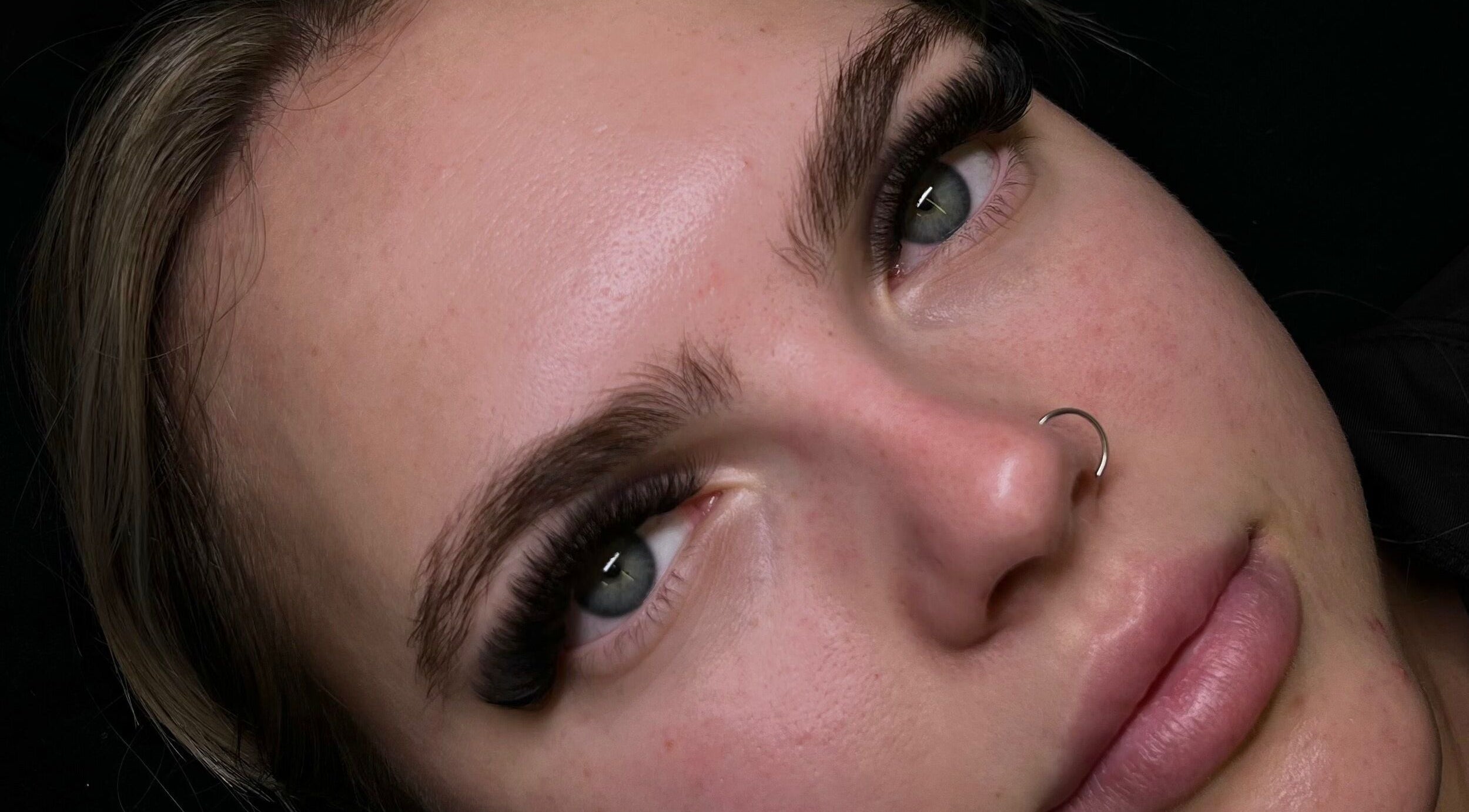 Close-up of eyelash extensions at Lashitude in Crowthorne, England, GB showcasing flawless beauty results.