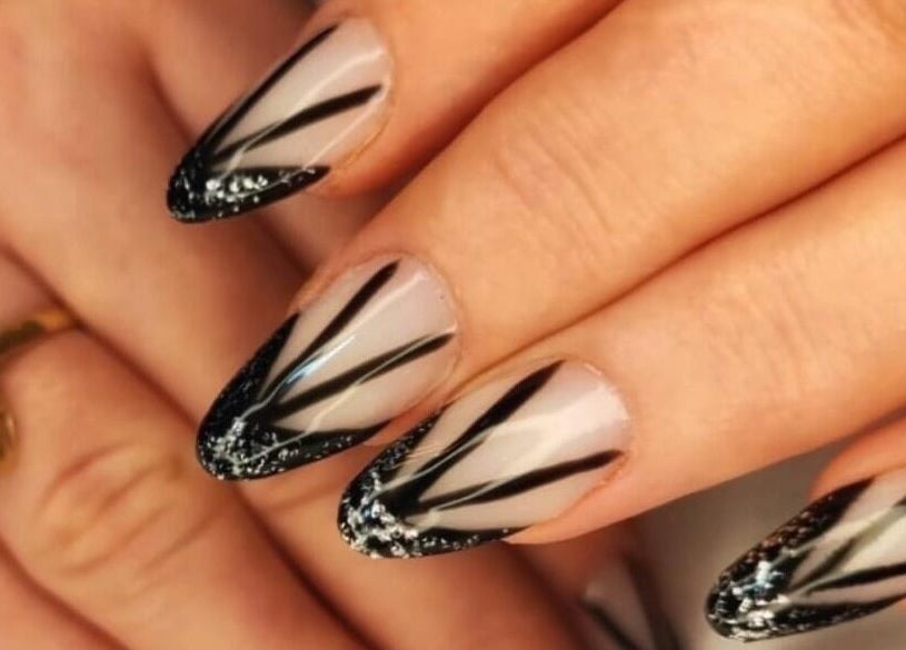 Elegant nail design with black and glitter details at Nails by Amber, Heywood, England, GB.