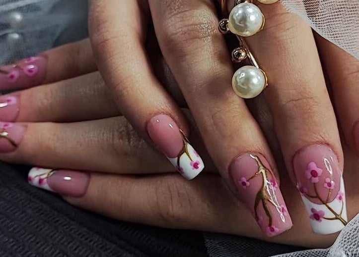 Elegant cherry blossom nail art by Nails by Amber, Heywood, England, GB. Perfectly manicured hands.