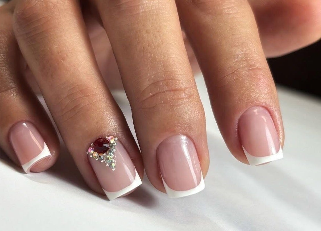 French manicure with rhinestone design at Nails by Amber, Heywood, England, GB.
