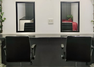Sleek styling stations at Mint & Co Hair & Nails, Pietermaritzburg, Gauteng, ZA enhance beauty services.