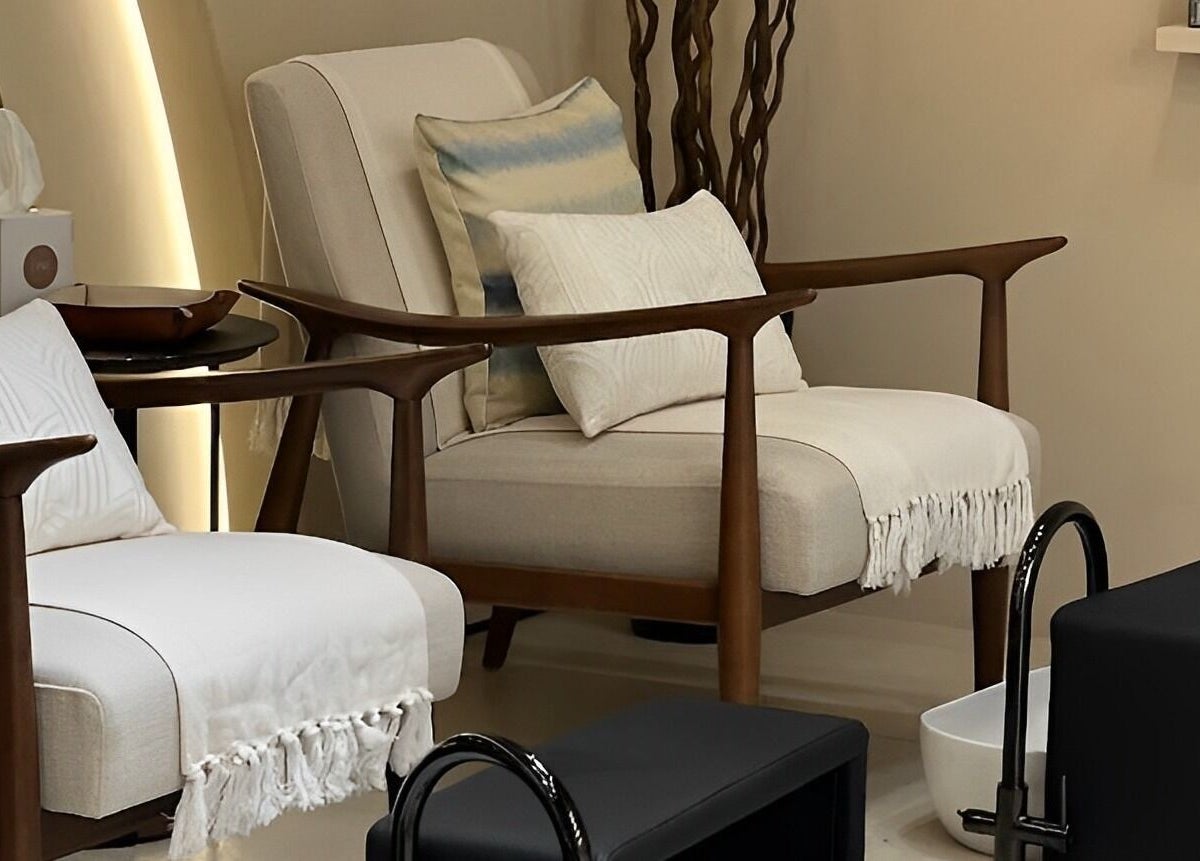 Relaxing seating area at Oak Spa, Sharjah, Sharjah, AE, featuring elegant chairs and foot basins.