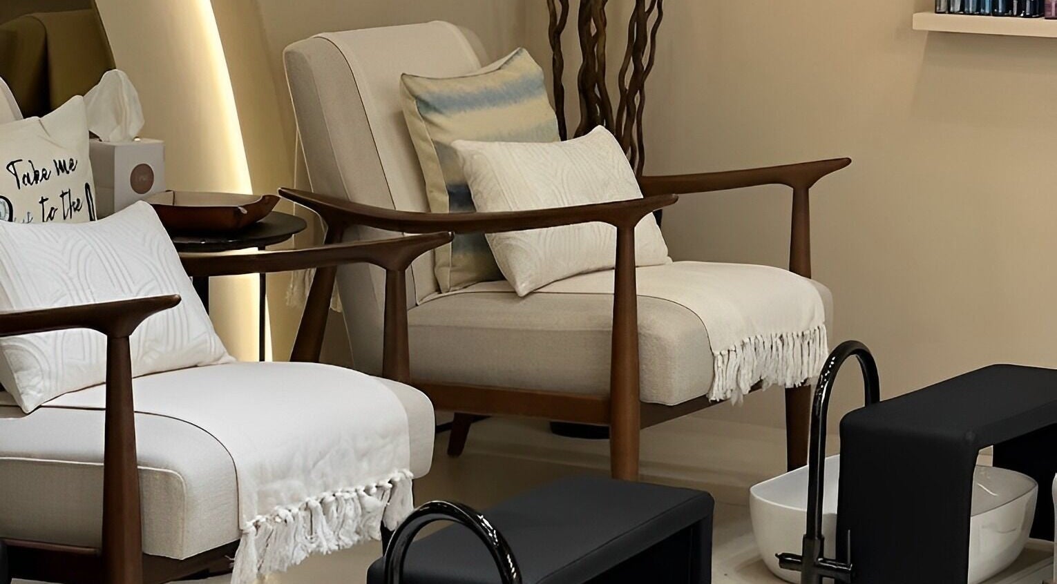 Relaxing seating area at Oak Spa, Sharjah, Sharjah, AE, featuring elegant chairs and foot basins.