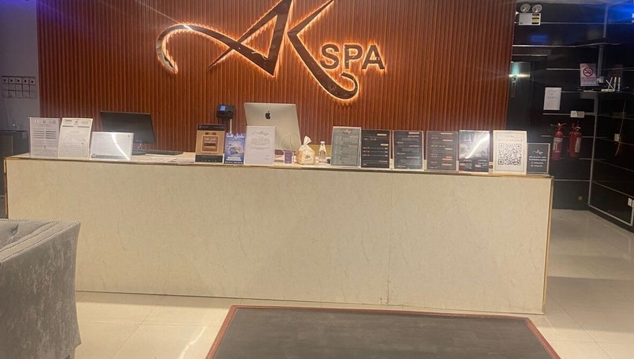 AK SPA reception desk in Al Hofuf, Eastern Province, SA, inviting guests with a polished, modern look.