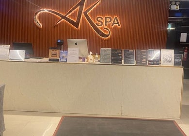 AK SPA reception desk in Al Hofuf, Eastern Province, SA, inviting guests with a polished, modern look.