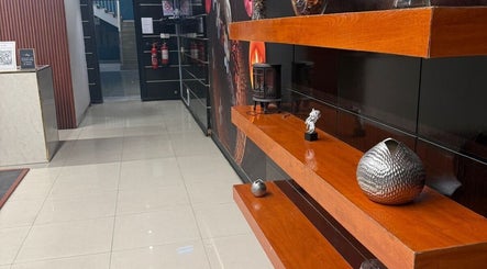 Sophisticated reception area at AK SPA, Al Hofuf, Eastern Province, SA with modern decor and warm lighting.