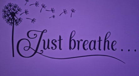 Inspirational wall art with 'Just breathe' at Massage By Chloe in Southam, England, GB.