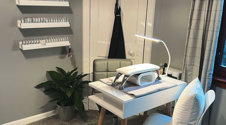 Elegant nail station at The Nail Spot, Peebles, Scotland, GB, showcasing modern salon decor.