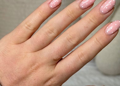 Elegant polka dot manicure at The Nail Spot, Peebles, Scotland, GB.